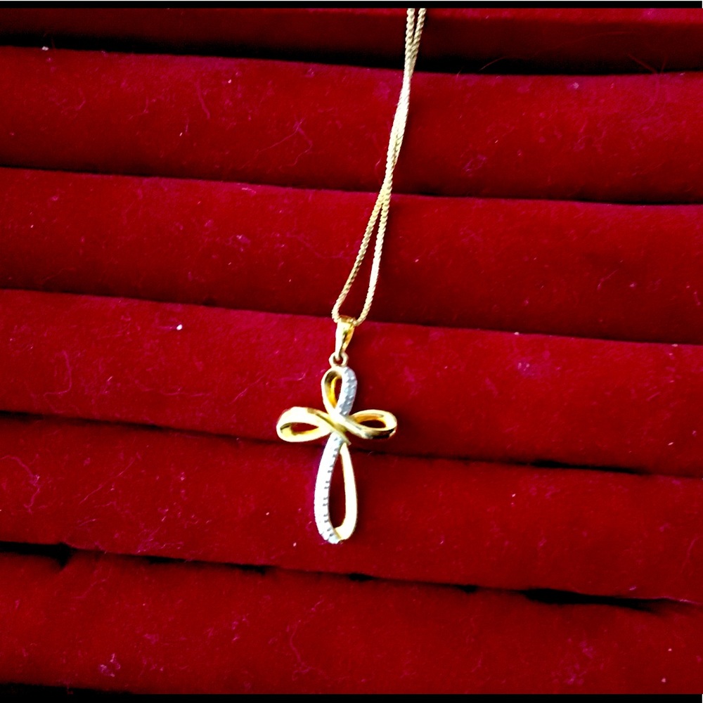 Gold plated cross with tiny diamonds
